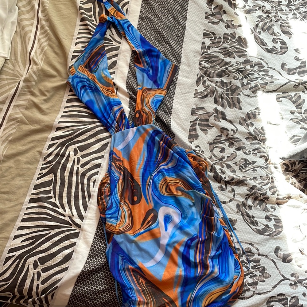This dress was bought in the cutest soho boutique. never worn or used.